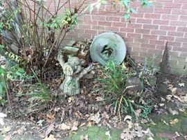 Go Hogs statue and vintage wheel