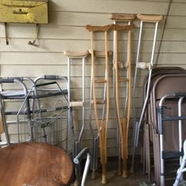 Crutches & canes along with folding chairs