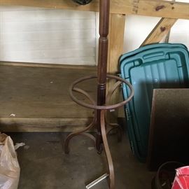 Bottom of hat rack - has place gif umbrellas/canes
