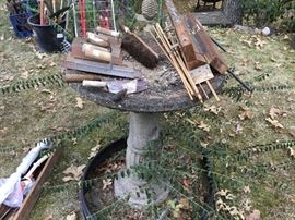 Great vintage bird bath and old tools