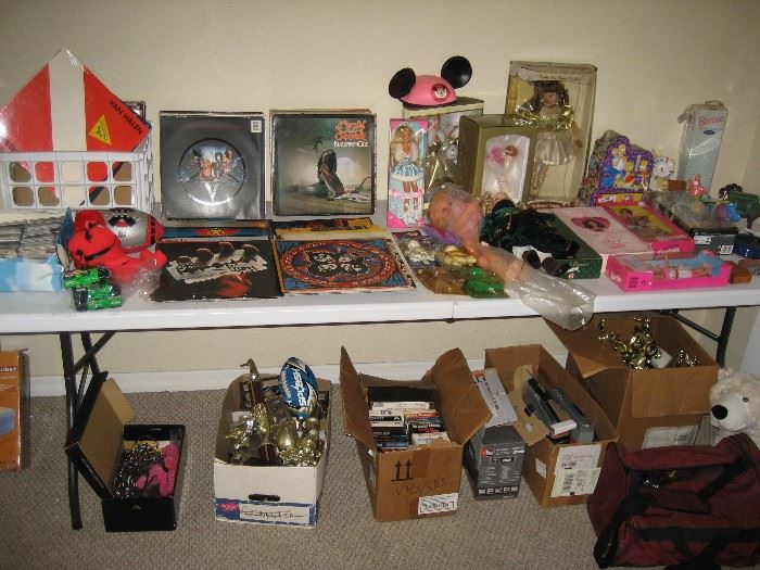 Vintage 70/80s Rock albums, Barbies, toys / trophies and more.