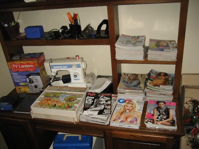 White sewing machine.  Huge collection of 90's 2000 magazines. Many sealed. Rolling Stone, SI,  Elle, Glamour, People and more. 