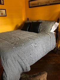 High quality comforter and pillows with contrasting bed skirt(not shown)