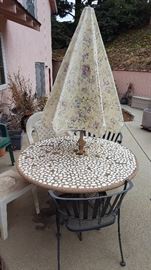 stone table and umbrella