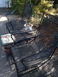 Two sping chairs and stack tables