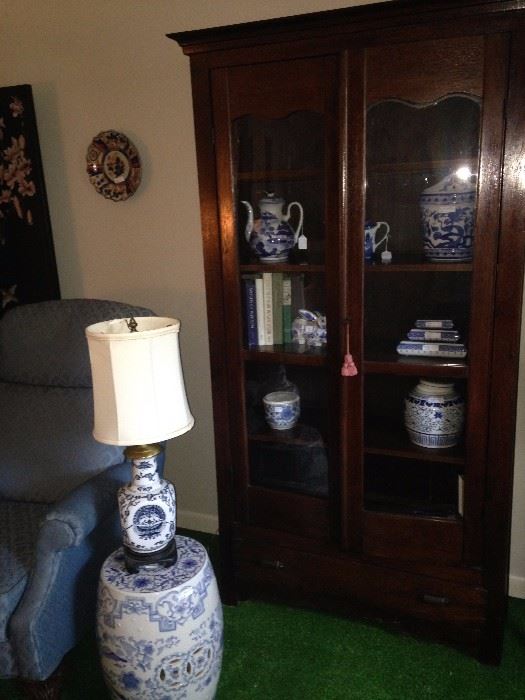 Blue & white garden stool and lamp; antique display cabinet with blue & white decor