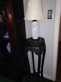 Plant stand; one of two white riticulated lamps