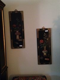 Two of four Asian panels with soapstone