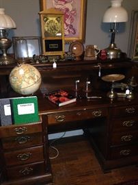 Roll top desk, globe, lamps, and other decor