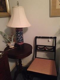 One of several mahogany drum top side tables