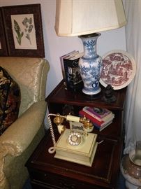 Two-tiered leather top side table; unique vintage telephone