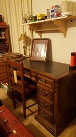 Antique wooden desk and chair. 