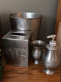 Silver (probably just in color) bathroom stuff. Kings and queens have this luxury in their bathrooms or outhouses. 