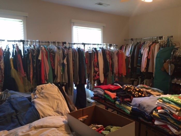 Awww the clothes room. How many items in this room? You do the math...Wife, daughter and son buy one item each, 7 days a week for 6 years straight. Then the wife and daughter buy 2 additional items each week because "it was on sale"...this is how many clothing items there are in this room. I bought one 4 pack of underwear and a new shirt during this time period for your information. 