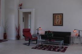 leather sofa and rocking leather chair, coffee table and side tables