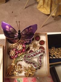 Vintage rhinestone earrings and brooches.  Moving butterfly pins