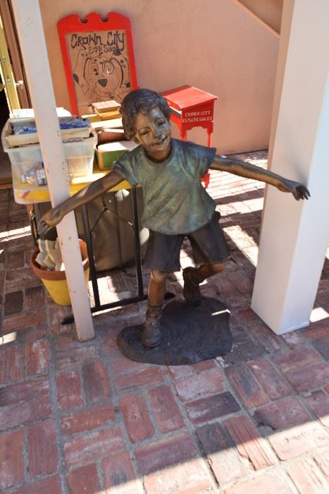 Bronze statue of little boy by Emil
