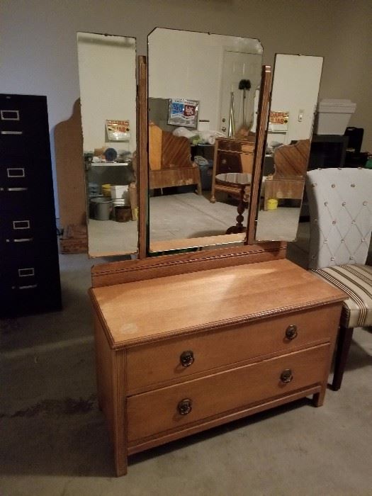Antique two drawer chest with tri fold mirror. Beautiful piece of Americana furniture.