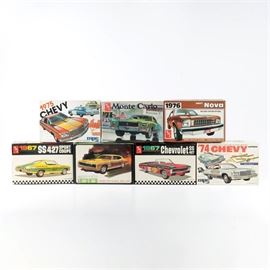 Seven 1970s Chevy Model Kits: An assortment of classic Chevrolet car model kits by AMT and MPC. These include: 1967 Chevrolet SS 427 Sport coupe, 1967 Chevrolet SS 427 convertible, 1974 Chevy Caprice with optional tilt trailer, 1968 Chevrolet Chevrolet SS 427, 1975 Chevrolet Caprice with tilt trailer, 1976 Chevrolet Nova and a 1971 Chevrolet Monte Carlo 454.