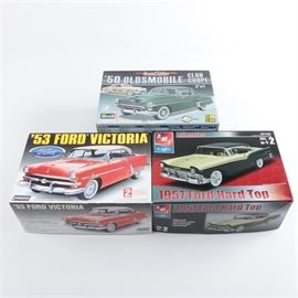 Collection of Ford and Oldsmobile Model Cars: A grouping of Ford and Oldsmobile model cars. Included in this grouping is a 1950 Oldsmobile Club Coupe by “Revel” and a 1953 Ford Victoria by “Lindberg.” Also included is a 1957 Ford Hard Top by “AMT ERTL.”