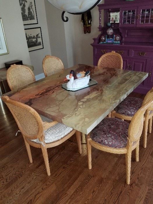 Custom Dining Table (with two extension) painted by Dan Poole in 1981. Dining set is being sold as a set and include 2 arm chairs with raffia bottoms, and four (4) side chairs with upholstered bottoms in great condition.  