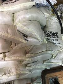 Bags and bags of holdback sand. Its also play sand
