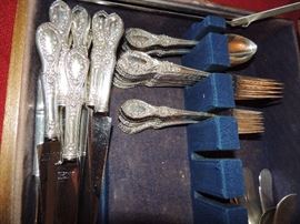 this 48 pc stunning rose pattern is solid sterling silver, except for top part of knife marked "manchester stainless".  buy it now price $1,200.00. all offers considered. call rick for details. 