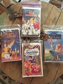 Rare Collection of Walt Disney Classic VHS Tapes 
Some Original Proofs of Purchase
CLassic Diamond Edition, Masterpiece Collection
       101 Dalmatians
         Lion King
         Beauty & The Breast
         Snow White & The Seven  
                Dwarfs