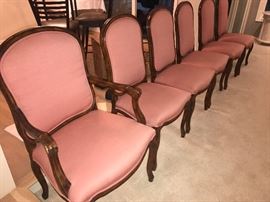 Set of six upholstered dining room chairs including one captain's chair