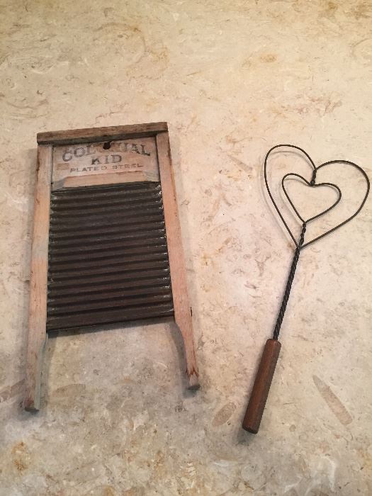 Washboard and vintage rug beater