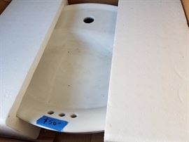 Cast iron, enamel clad Kohler bathroom sink (white)