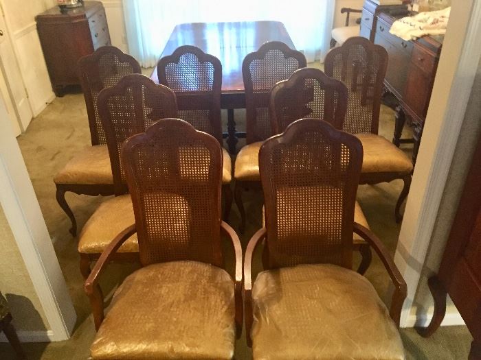 Set of 8 cane chairs