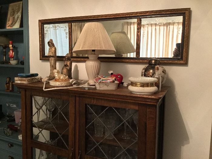 Curio cabinet, lamp and mirror