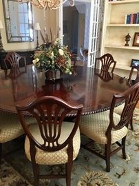 7' round dining table with 10 chairs