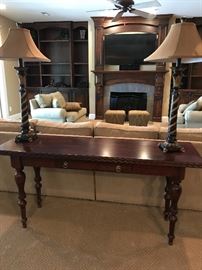 Extra long console table that converts to an open position by Ethan Allen
