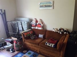 Loveseat (matching loveseat not pictured), blankets, pillows, unique (creepy?) collectible santas, luggage, electronics, Harvard print (brand new), stuffed animals (not creepy)
