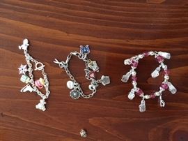 Three Nice Charm Bracelets.