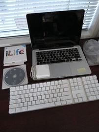 One of (2) Mac Book Pro Laptop Computers with Software and Wireless Keyboard