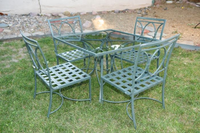 Green Outdoor Four Chair Patio Set With Glass Top Table