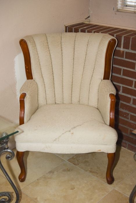 Cream Colored Wing Back Sitting Chair
