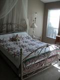 Ornate Iron Bed in Master Bedroom