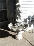 Concrete fountain with boy/girl figures
