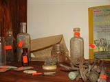 Indian arrow heads, old bottles, square nails, etc. dug up from area of General Custers last stand.
