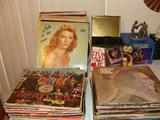 Vintage Albums including the Beatles Sgt Peppers Lonely Hearts Club,  Beatlerama and more. This collection has many of the Classic Singers of the 50's, 60's and 70's, from Elvis to Julie London to Johnny Cash to Dinah Washington, Tony Bennett, Helen Reddy, Sam the Sham, to name but a few, think of an artist they may be here. Call and ask if you would like I have a list.