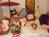 A small sampling of the material, crochet items, scarves, etc. at this estate