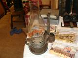 Antique metal oil lamp with finger hold and metal wall mount with matching match holders on each side. Very rare piece.