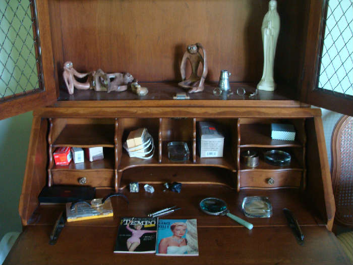 Showing contents of drop front secretary. Notice the 2 1950's magazines & unusual magnifying glass & more!