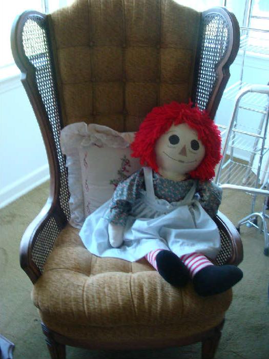 Vintage Wing Back Chair with Rattan Wings.....is that Raggedy Ann I see sitting there?