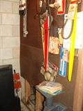 Wall of belts plus tool stand, etc.