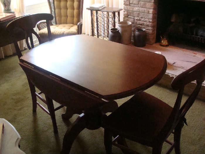 Beautiful antique solid wood (cherry?) drop leaf table and matching pair of high back chairs